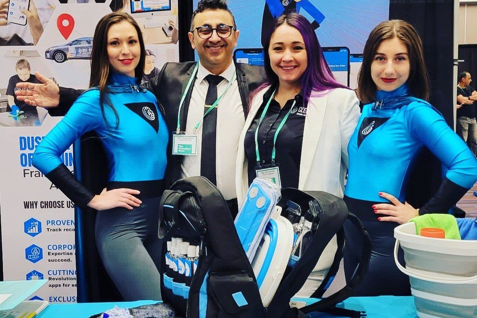 Cleany co-founders and team at a franchise show