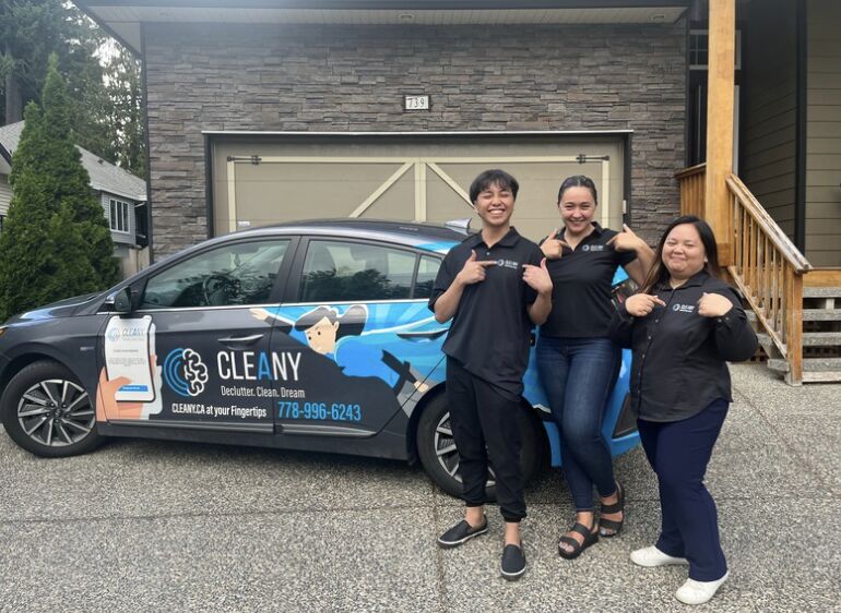 Cleany franchise owners with the Cleany car