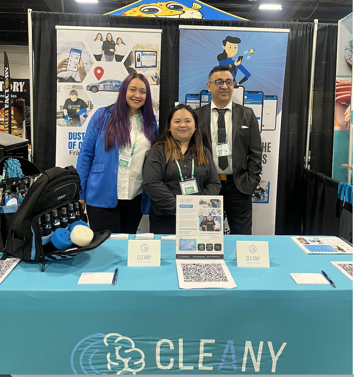 Cleany team at a franchise show booth